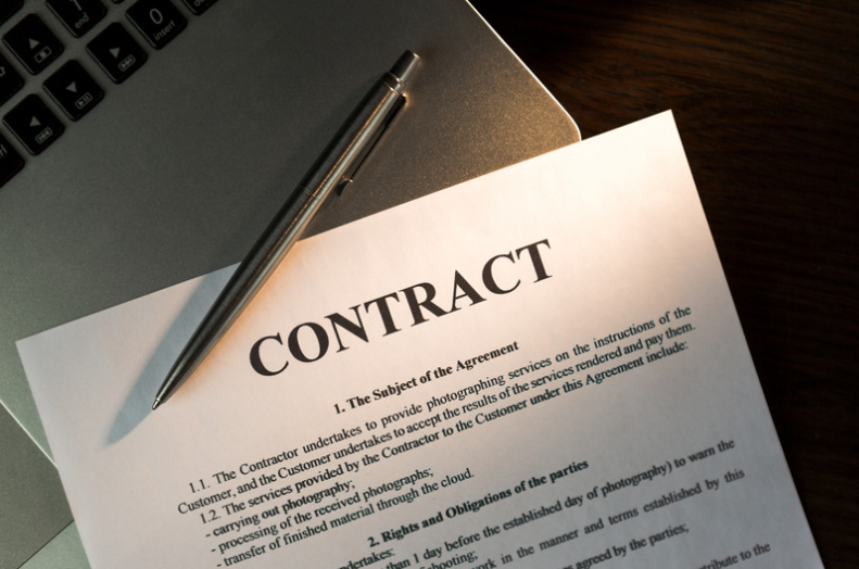 contract on laptop